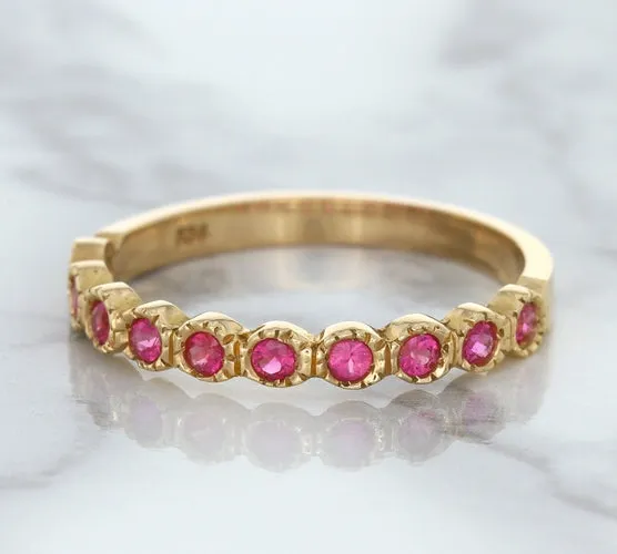 0.26ctw Round Pink Sapphire Ring in 14K Rose Gold