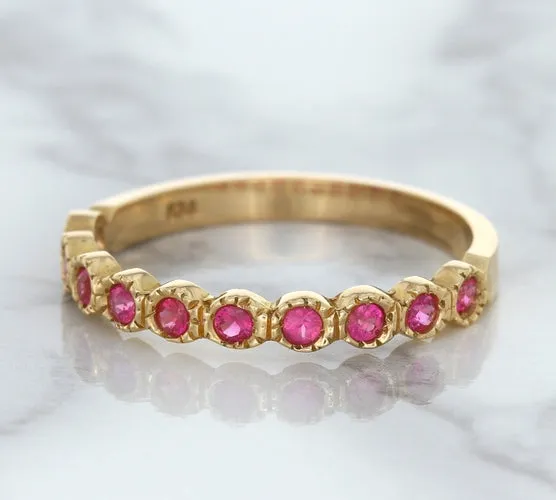 0.26ctw Round Pink Sapphire Ring in 14K Rose Gold