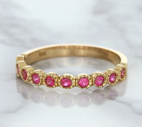 0.26ctw Round Pink Sapphire Ring in 14K Rose Gold