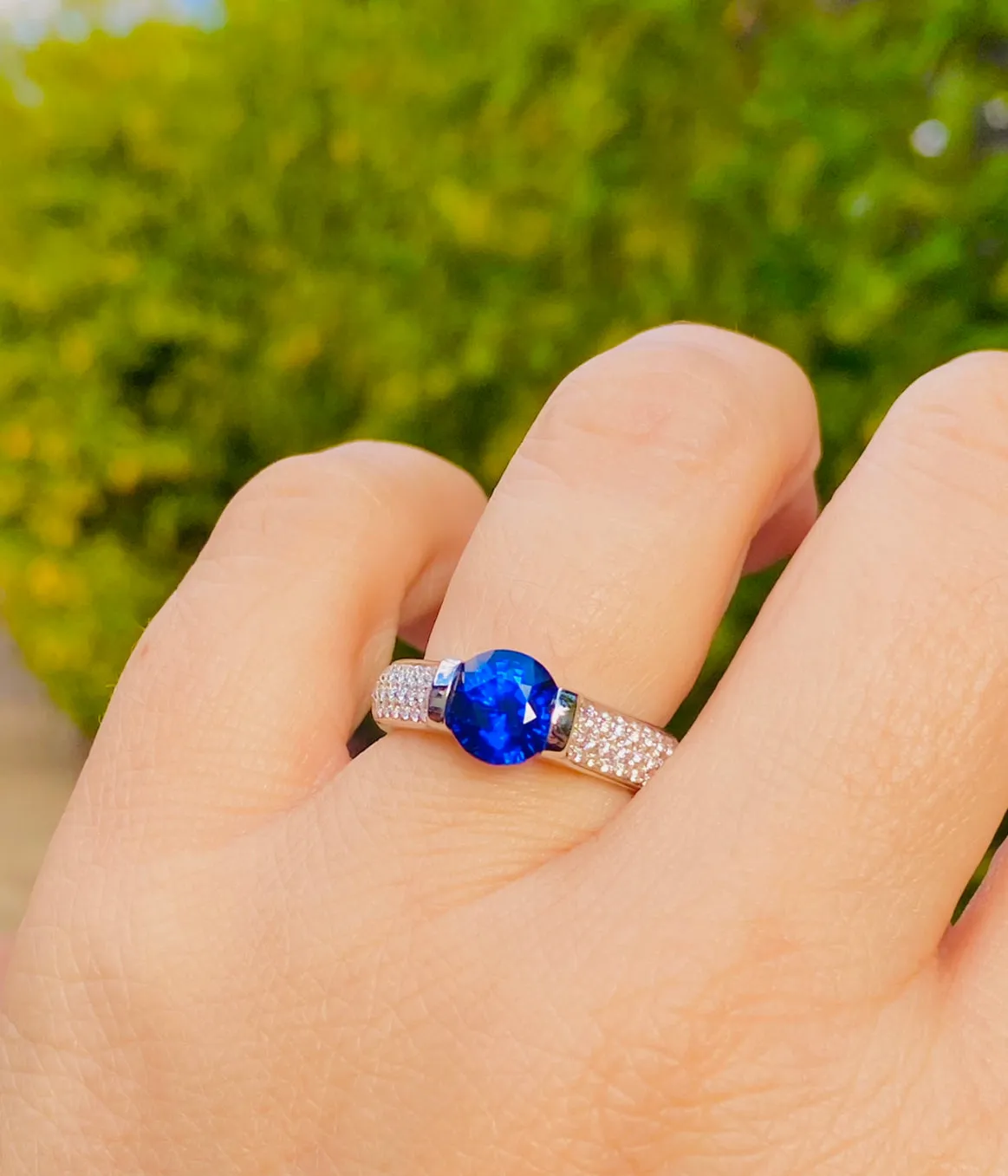 2.33 ct. GIA Blue Sapphire set in Omega 3-Row Pave
