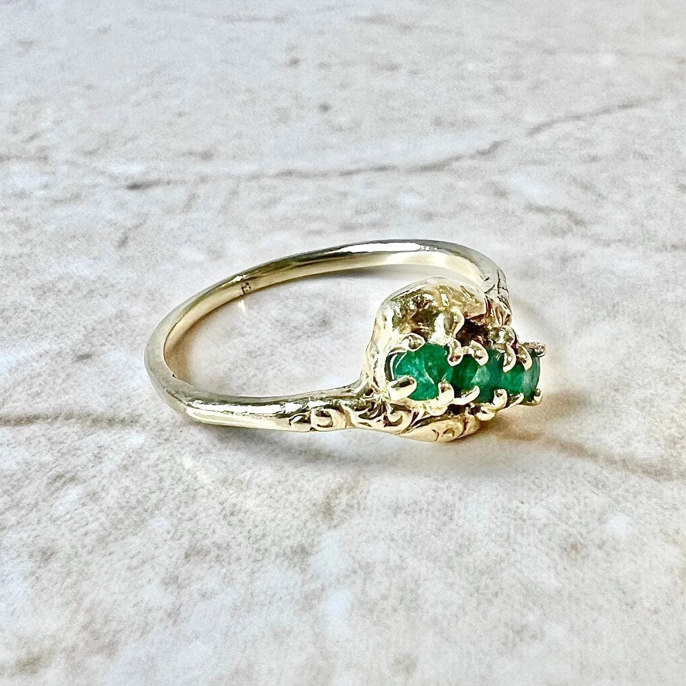 Antique 14 Karat Yellow Gold Natural Emerald Three-Stone Ring