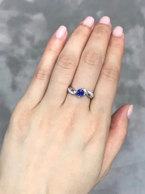 Blue Sapphire and Diamond Twist Ring