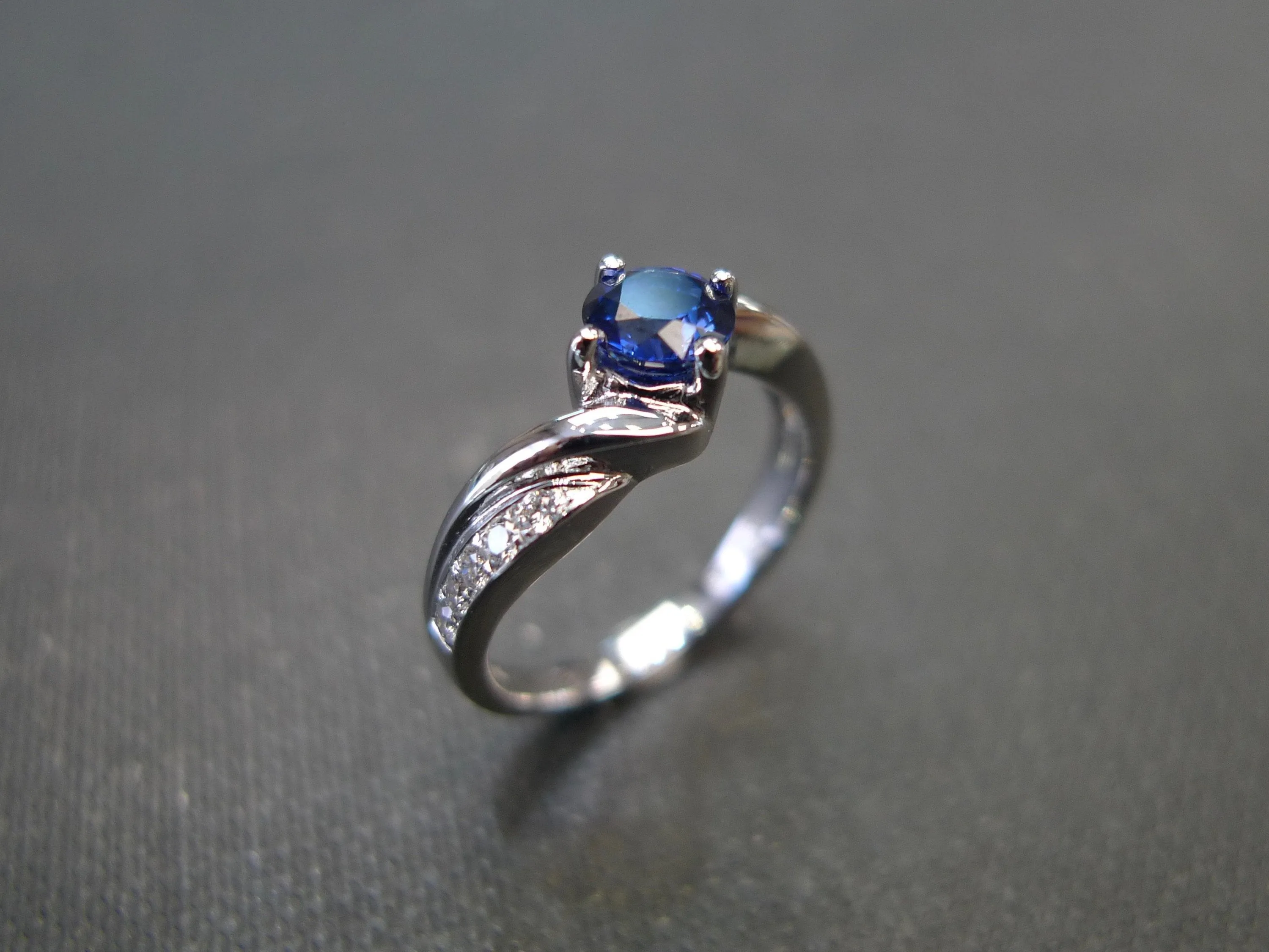 Blue Sapphire and Diamond Twist Ring