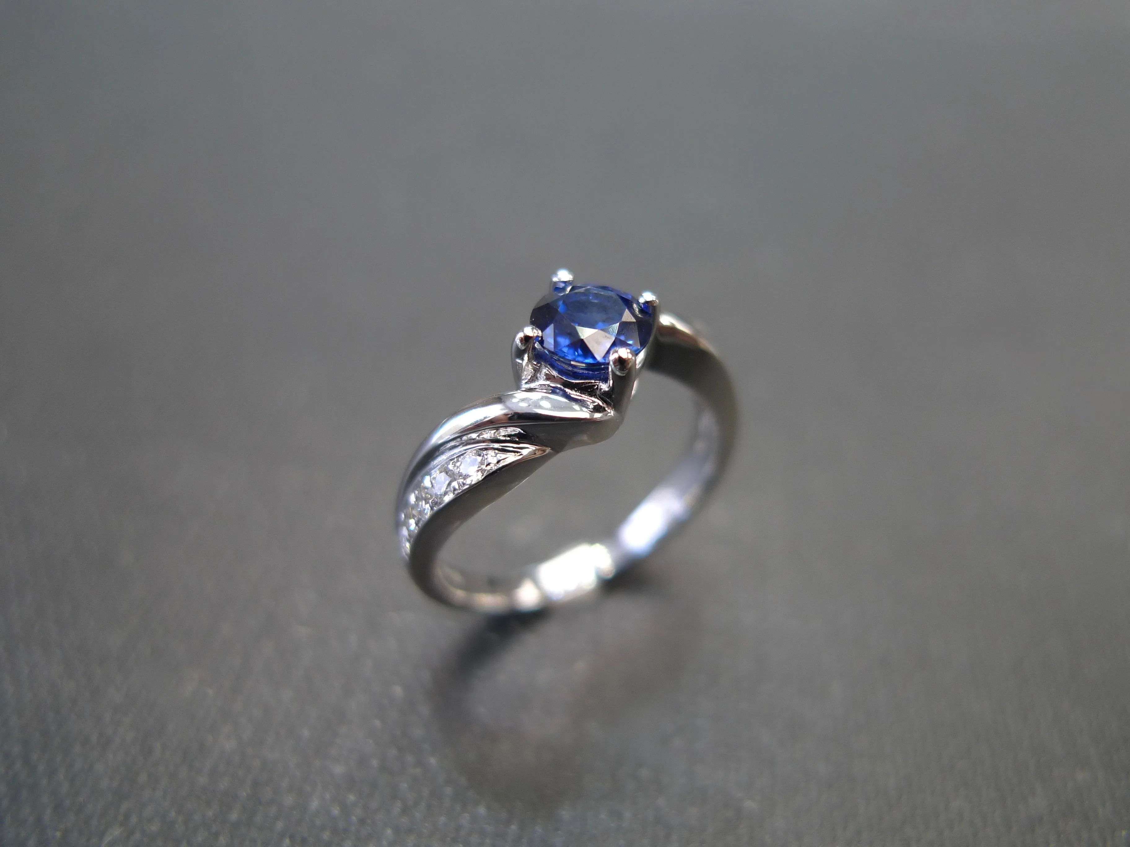 Blue Sapphire and Diamond Twist Ring