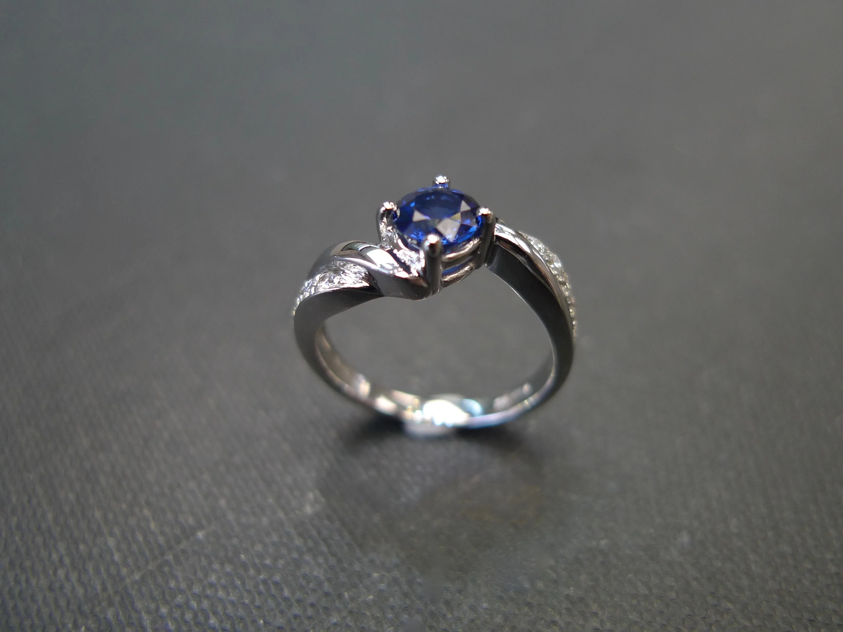 Blue Sapphire and Diamond Twist Ring