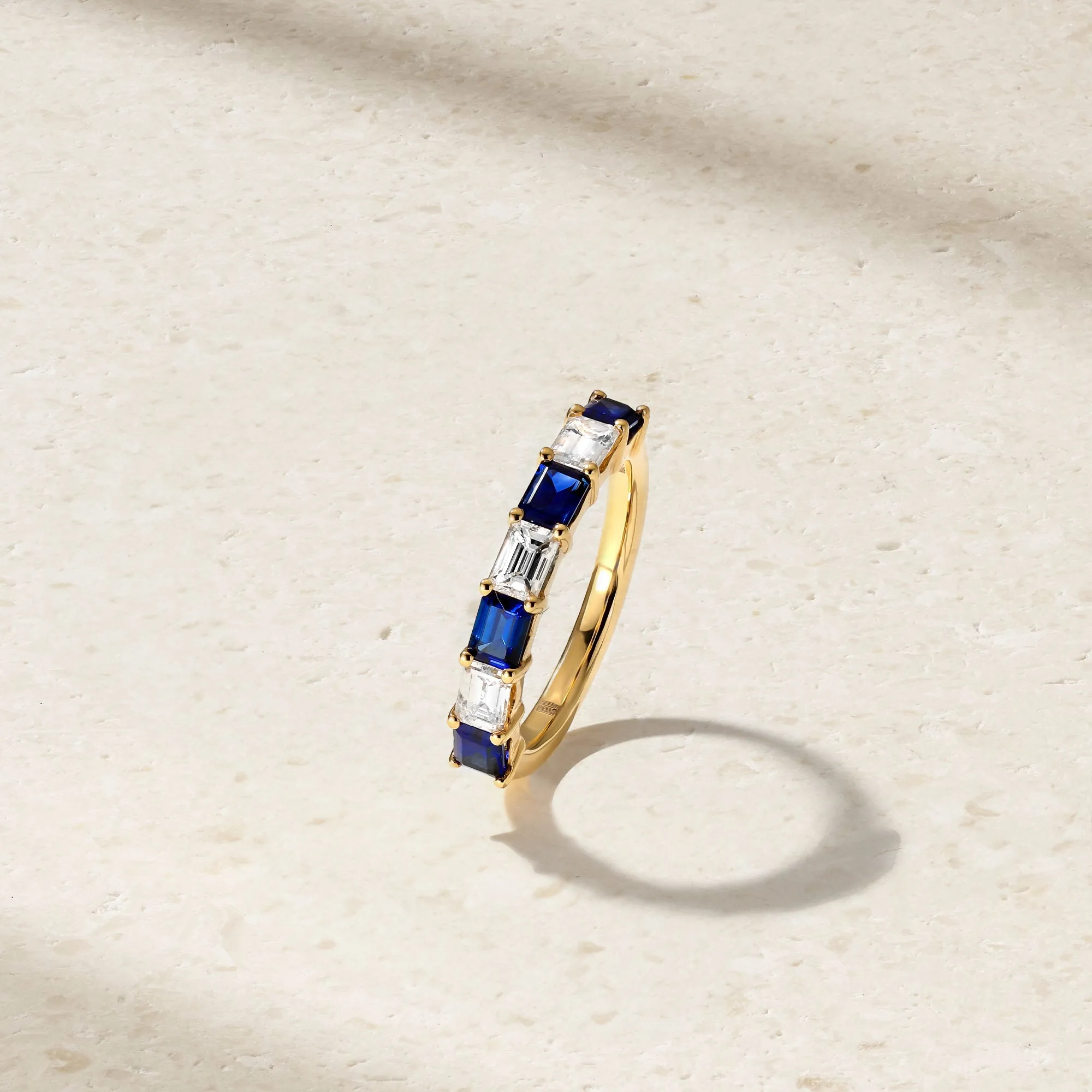 East-West Emerald Cut Sapphire and Diamond Band