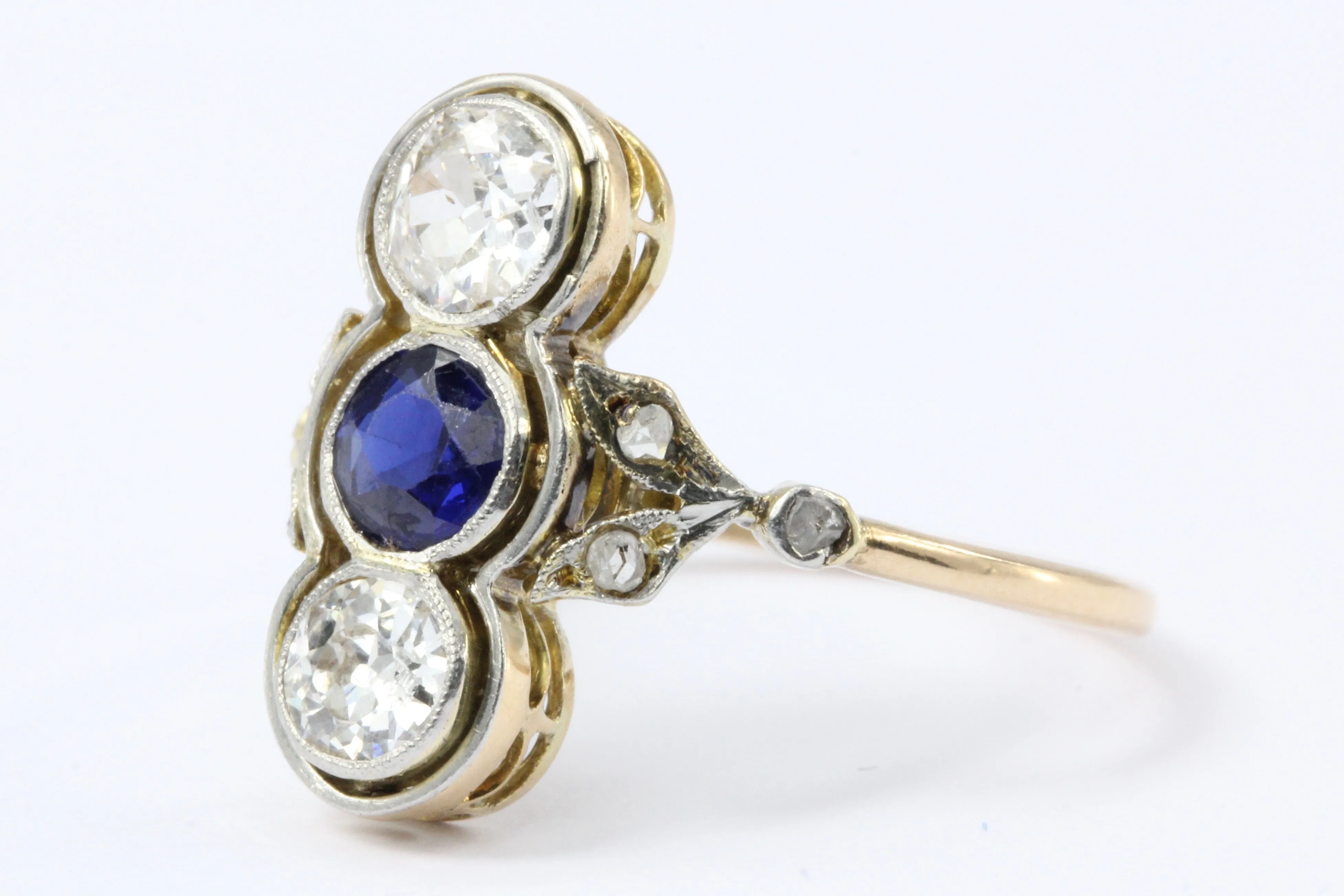 Edwardian 18K Yellow Gold Platinum Top Diamond and Sapphire Three Stone Ring