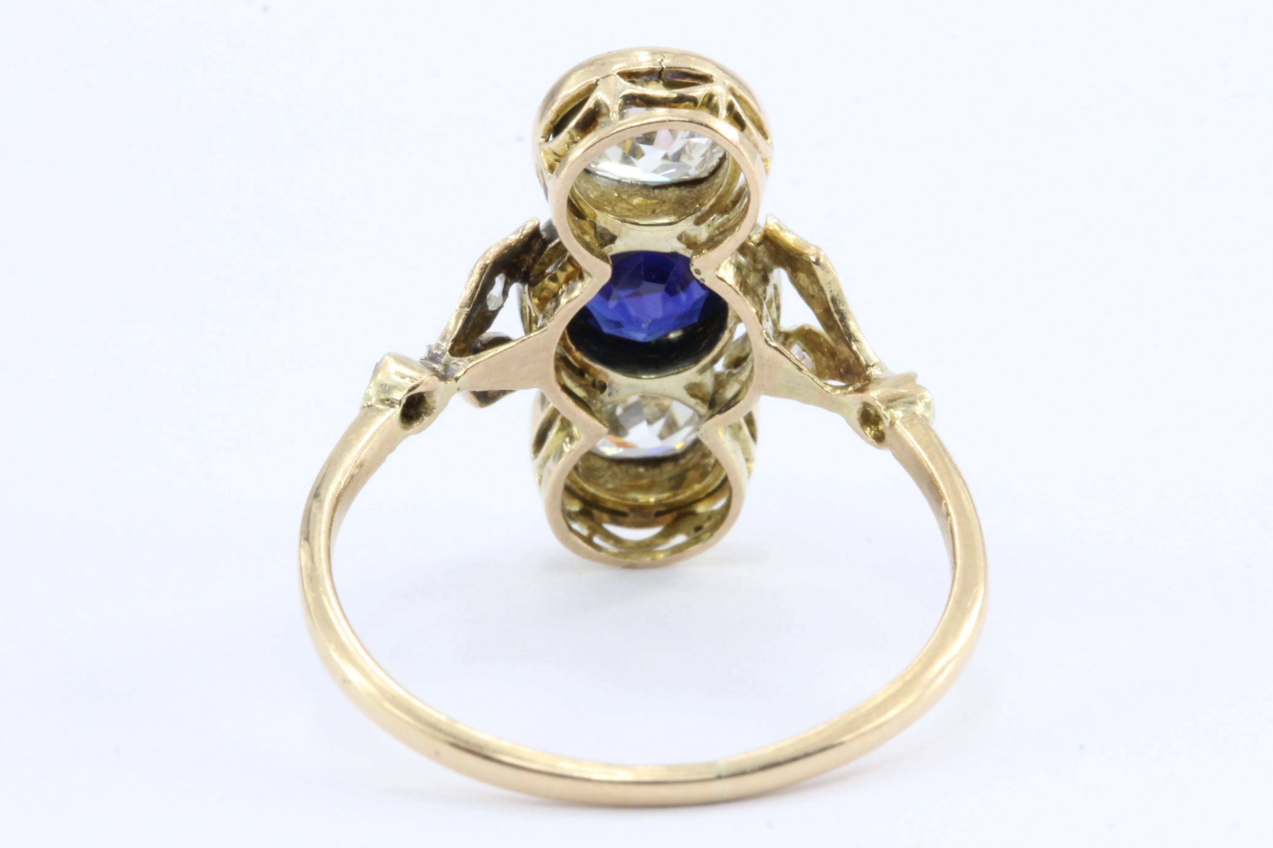 Edwardian 18K Yellow Gold Platinum Top Diamond and Sapphire Three Stone Ring