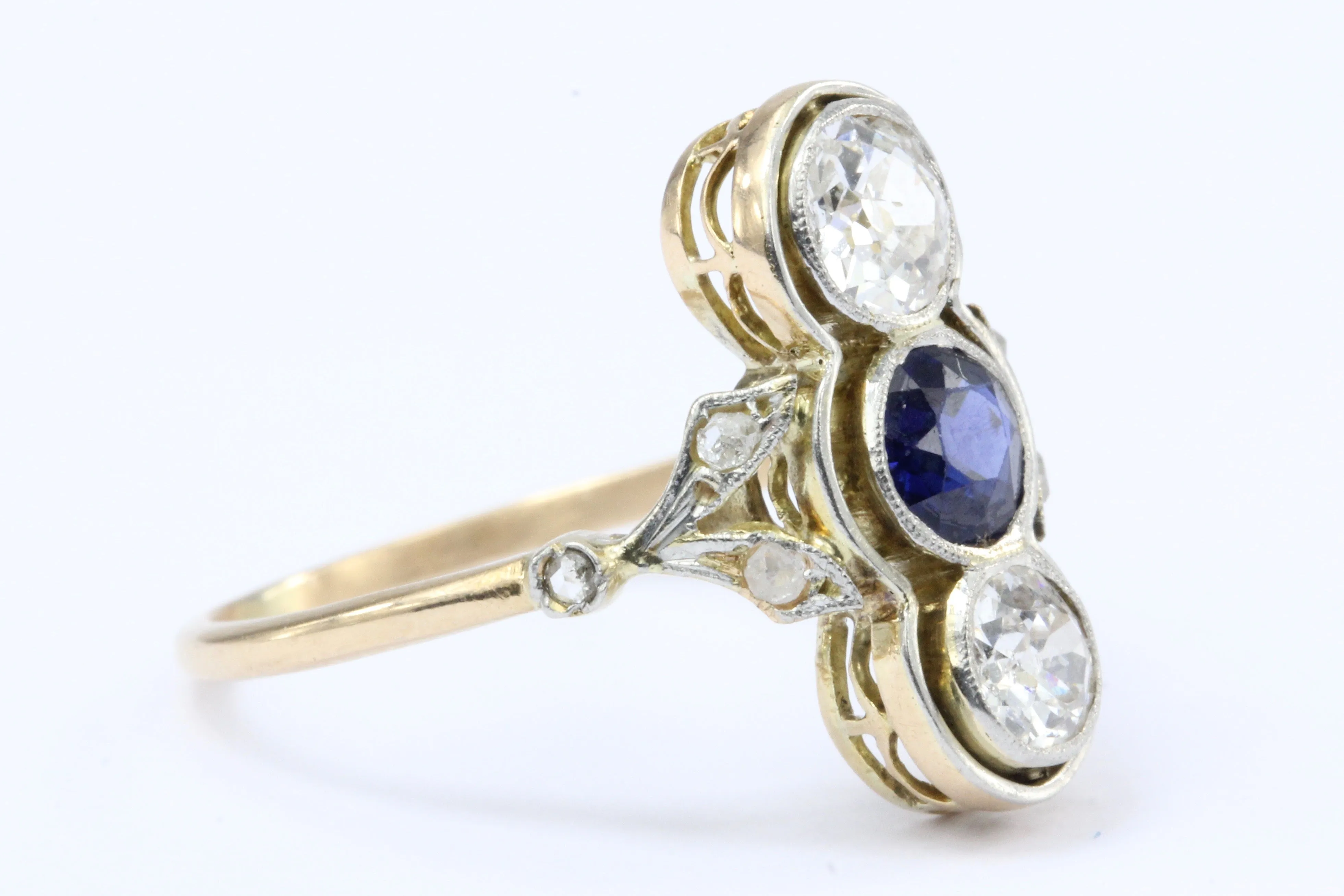 Edwardian 18K Yellow Gold Platinum Top Diamond and Sapphire Three Stone Ring