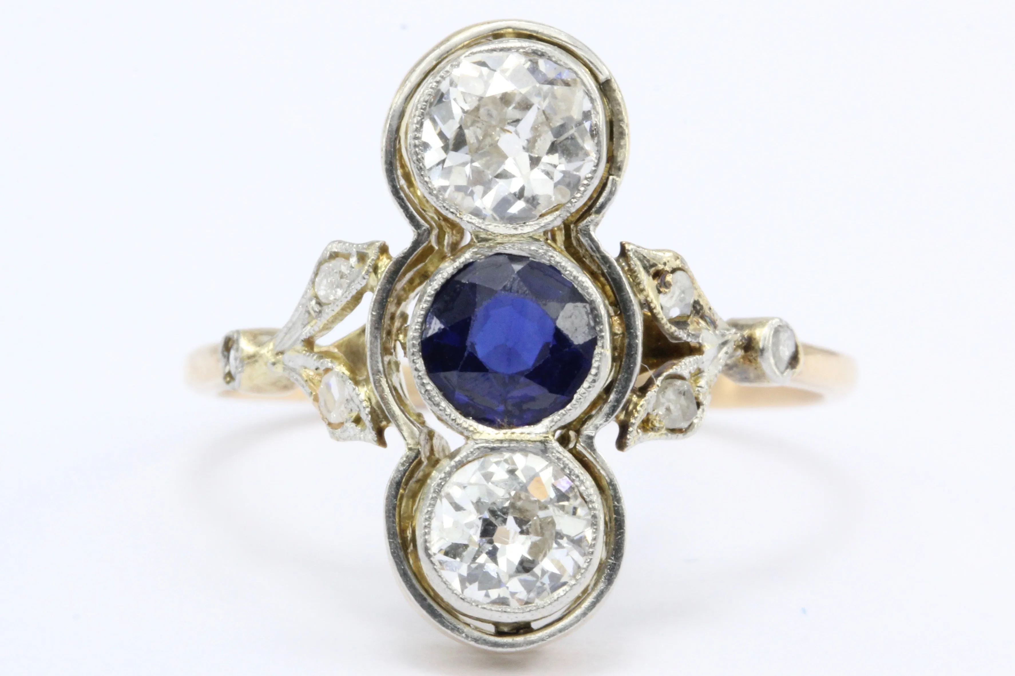 Edwardian 18K Yellow Gold Platinum Top Diamond and Sapphire Three Stone Ring