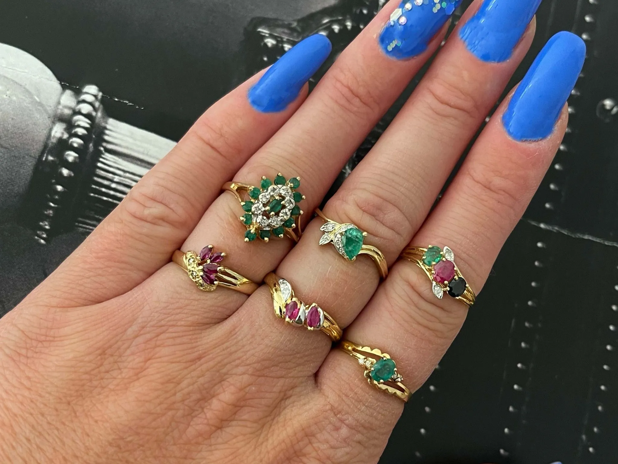 Emerald and Diamond Halo Ring in 14k Yellow Gold