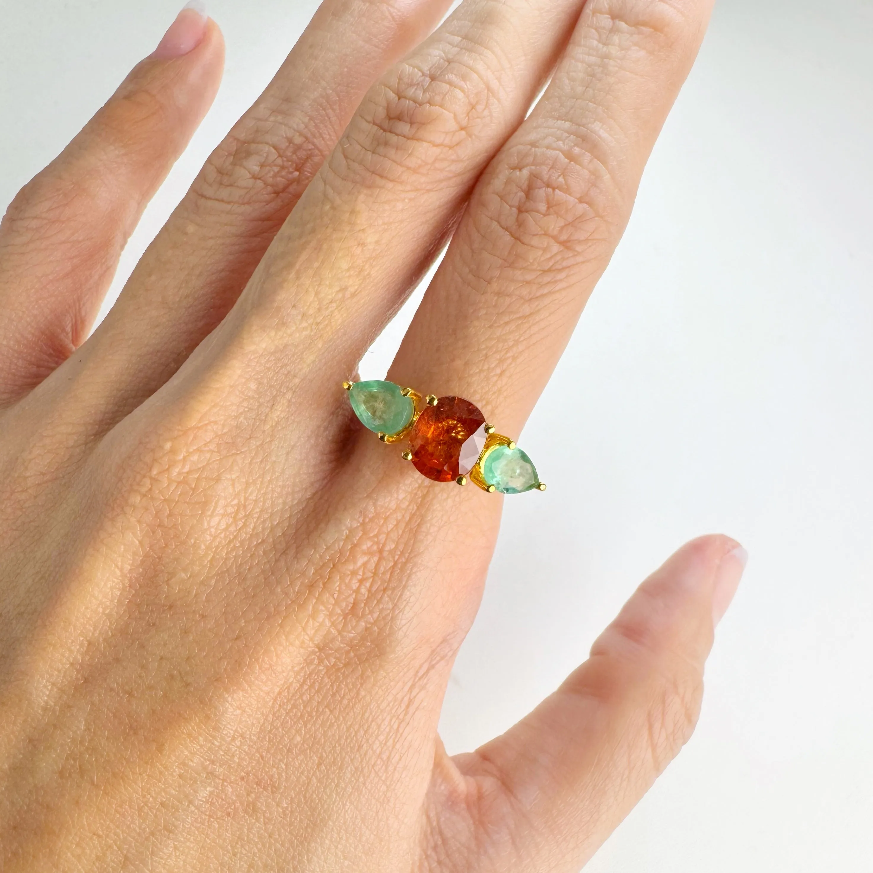 Handmade 7 x 8 mm. Oval Cut Orange African Spessartine Garnet and Emerald Trilogy Ring