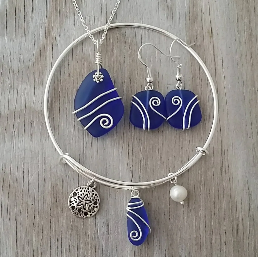 Handmade in Hawaii, Wire wrapped cobalt blue sea glass necklace   earrings   bracelet set, Sand dollar, "September Birthstone"