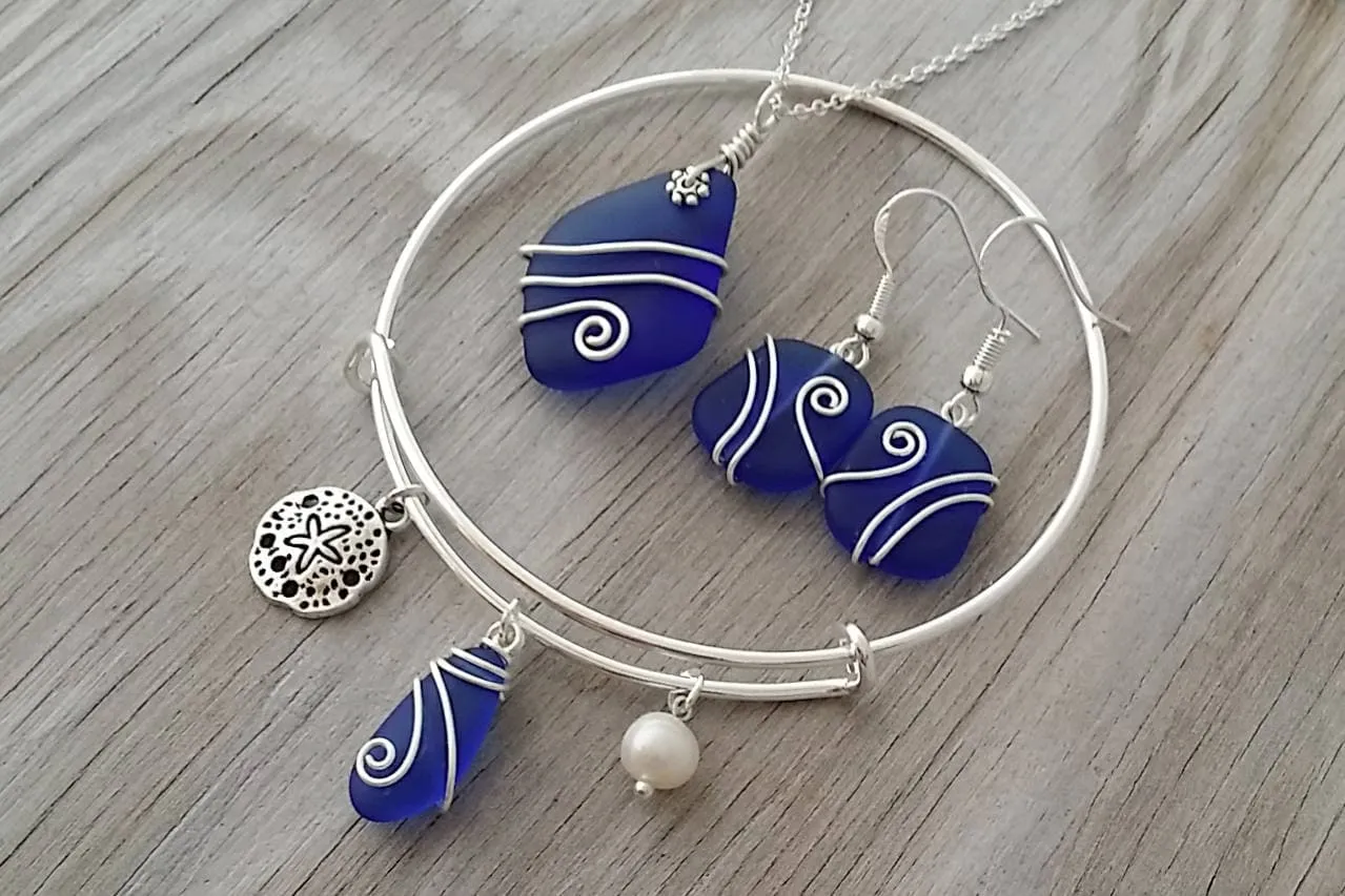 Handmade in Hawaii, Wire wrapped cobalt blue sea glass necklace   earrings   bracelet set, Sand dollar, "September Birthstone"
