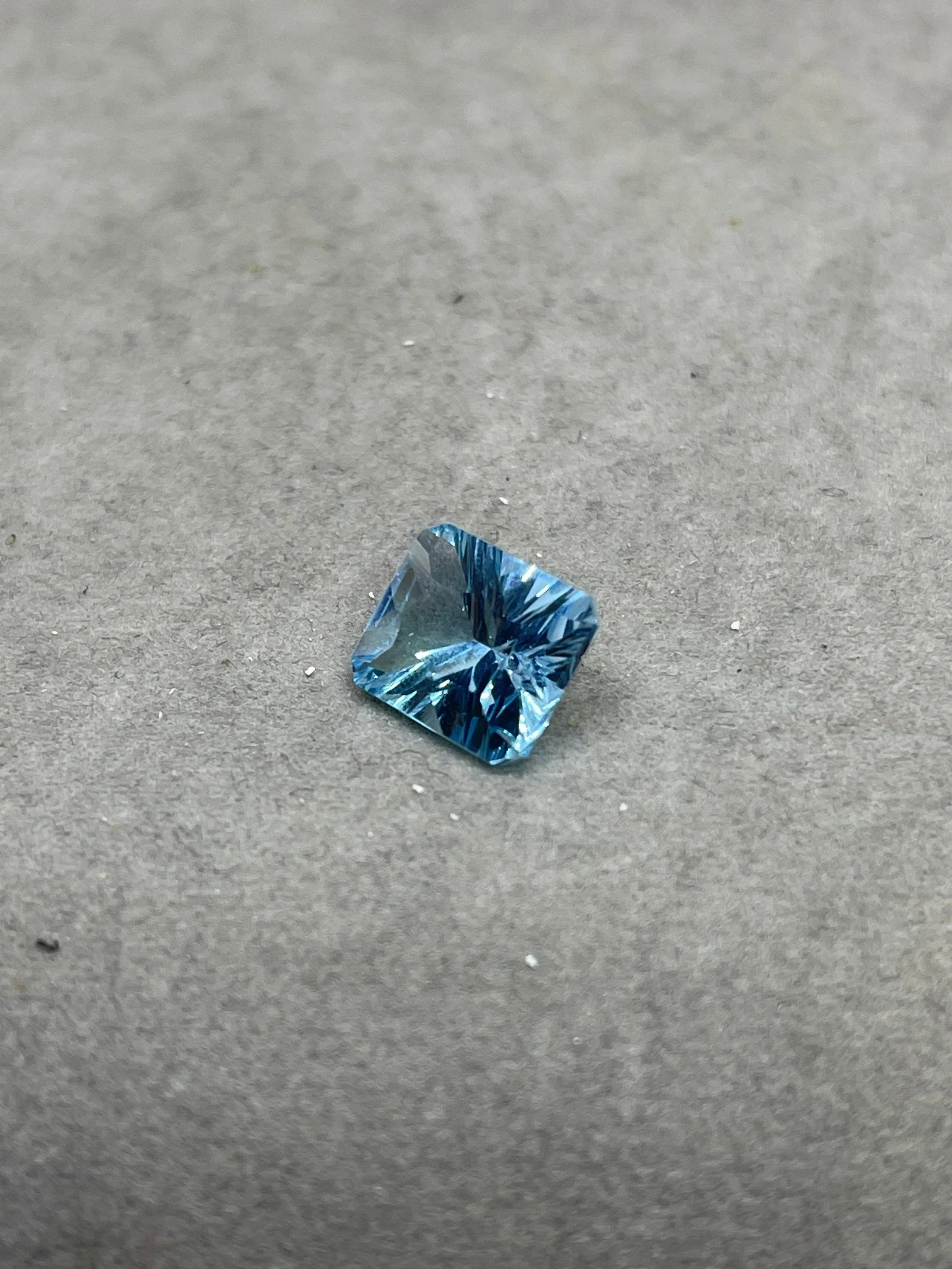 Laser Concave Cut Swiss Blue Topaz 12x10x7 Emerald Cut Loose Gemstone