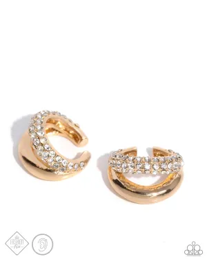 Sizzling Spotlight - Gold - White Rhinestone Encrusted Paparazzi Ear Cuff Earrings - April 2024 Magnificent Musings