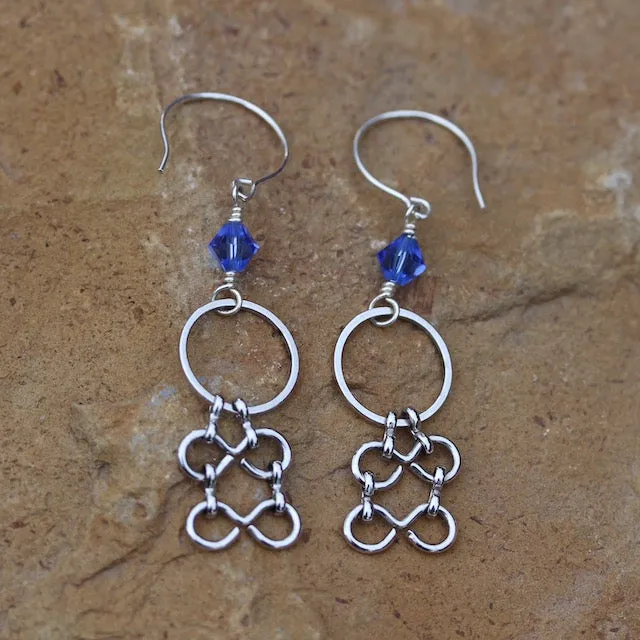Statement chain earrings with sapphire blue Swarovski crystals
