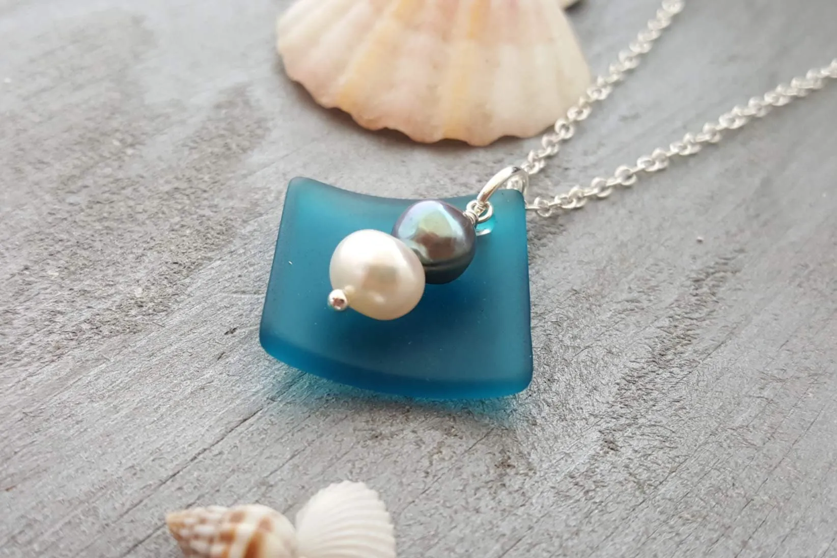 The "Balance of Life" - a Hawaii lifestyle and mentality, Curved Teal sea glass Necklace with White and Purple natural pearls